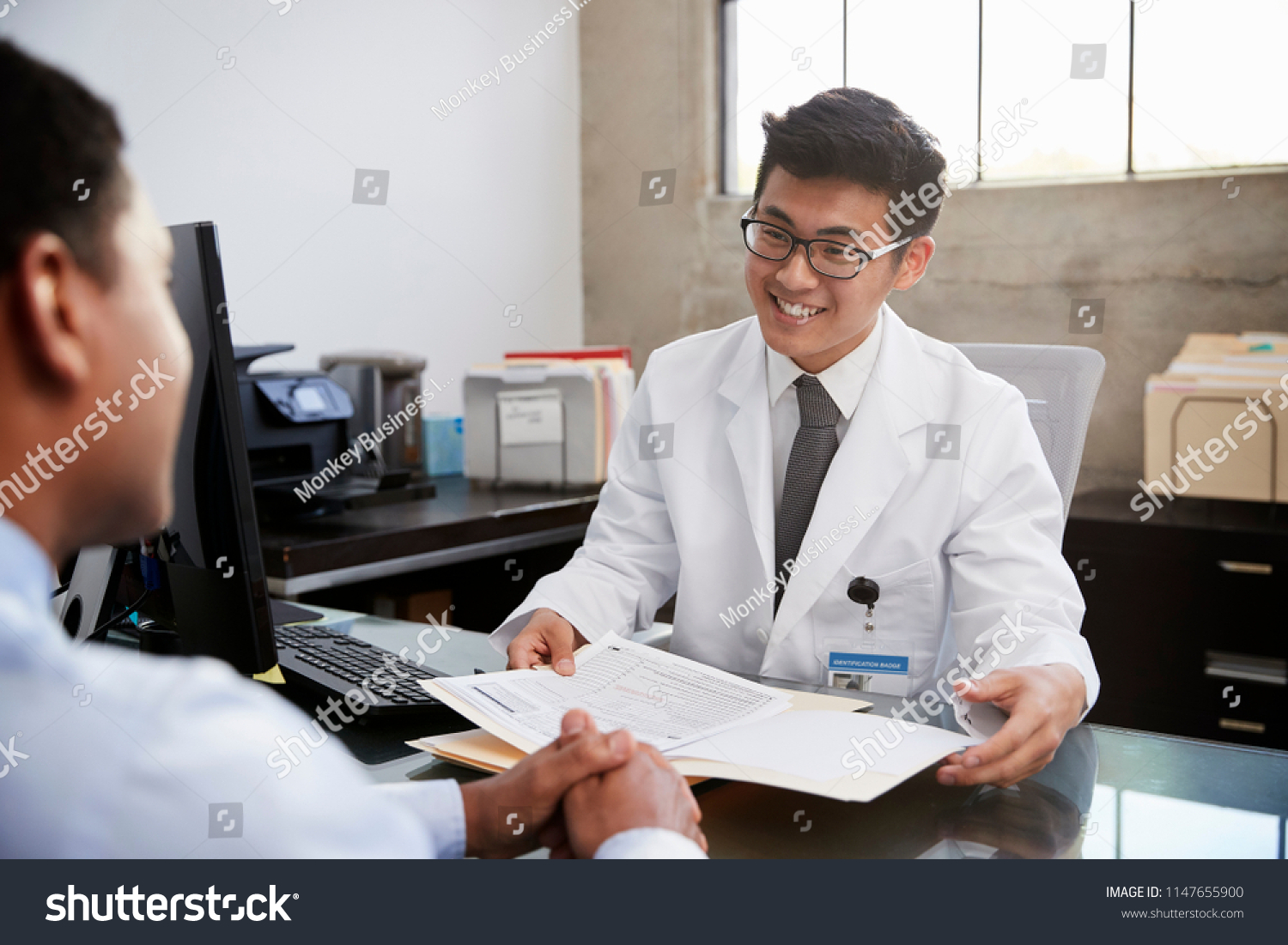 Doctor consulting with a patient at a Nexxarra clinic